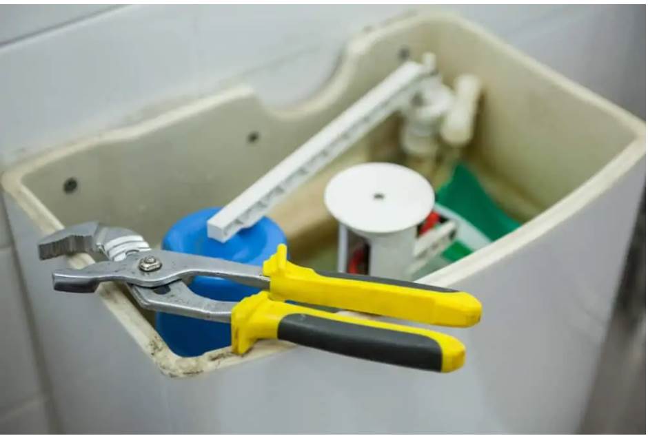 how-to-remove-a-stuck-plastic-lock-nut-from-a-toilet-tank